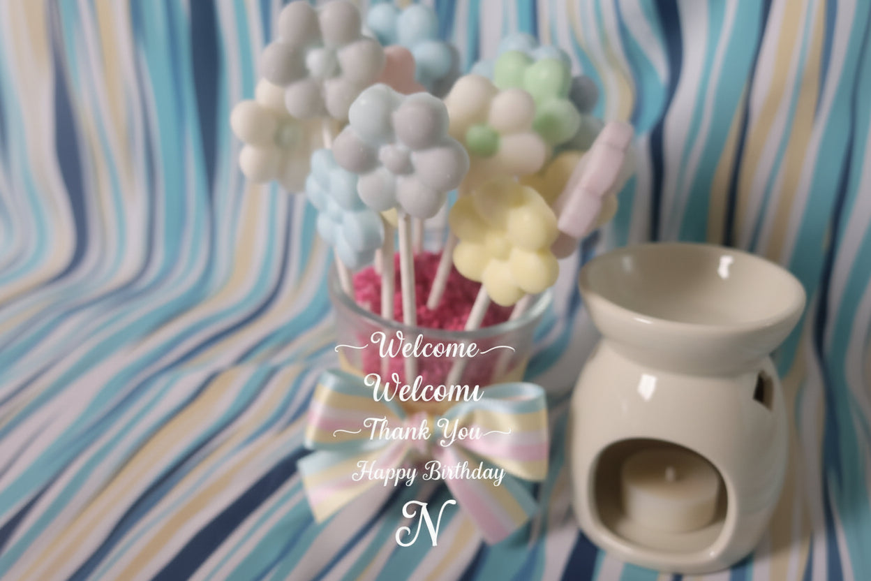 Colorful flower-shaped wax melts with ribbon gift ideas